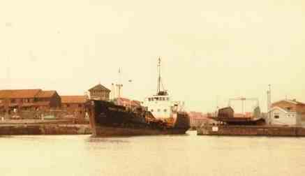 The sand dredger Harry Brown exiting junction lock, circa 1989